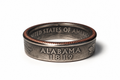 A silver-colored coin ring featuring the words 'ALABAMA 1819' and 'UNITED STATES OF AMERICA' engraved on the front, with a textured copper-toned inner rim, shown on a white background.